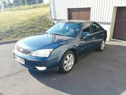 Mörkblå Begagnad 2004 Ford Mondeo Ghia Halvkombi | 14 900 kr