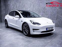 Vit Begagnad 2021 Tesla Model 3 Standard Range Plus Sedan | 234 800 kr (Marknadspris)
