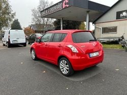 Röd Begagnad 2014 Suzuki Swift Halvkombi | 64 900 kr (Marknadspris)