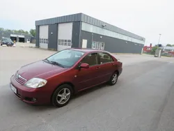 Mörkröd (röd) Begagnad 2005 Toyota Corolla Sedan | 28 999 kr (Bra pris)