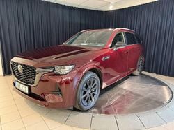 Röd metallic Begagnad 2024 Mazda CX-80 Homura-Line SUV | 599 800 kr (Marknadspris)