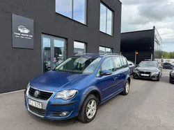 Mörkblå Begagnad 2009 VW Touran Cross Freestyle Minibuss | 65 000 kr (Lite dyr)
