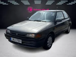 Mörkgrå Begagnad 1992 Mazda 323 Halvkombi | 10 900 kr