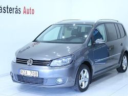 Mörkgrå Begagnad 2011 VW Touran GT Minibuss | 74 900 kr (Dyr)