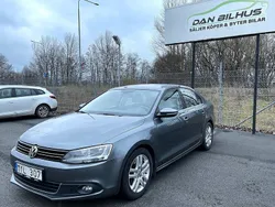 Mörkgrå (grå) Begagnad 2011 VW Jetta Sedan | 79 900 kr (Marknadspris)