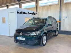 Mörkgrön (grön) Begagnad 2011 VW Touran Minibuss | 84 900 kr (Marknadspris)