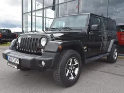 Svart Begagnad 2014 Jeep Wrangler Unlimited Sahara SUV | 299 900 kr (Marknadspris)