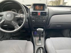 Röd Begagnad 2003 Nissan Almera Halvkombi | 33 000 kr (Marknadspris)