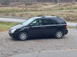 Svart Begagnad 2010 Kia Carnival Minibuss | 34 000 kr