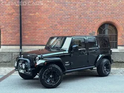 Svart Begagnad 2011 Jeep Wrangler Unlimited SUV | 299 900 kr