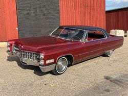 Mörkröd Begagnad 1966 Cadillac Coupé DeVille Sportkupé | 149 000 kr