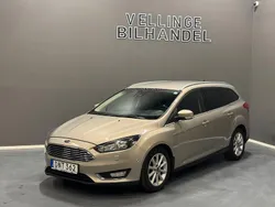 Grå Begagnad 2014 Ford Focus Titanium Kombi | 79 900 kr (Marknadspris)