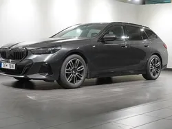 Grå Begagnad 2024 BMW 520 M Sport Kombi | 618 800 kr (Dyr)