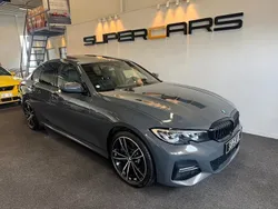 Grå Begagnad 2021 BMW 330e M Sport Sedan | 348 000 kr (Marknadspris)