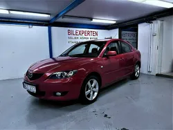 Röd Begagnad 2004 Mazda 3 Exclusive-Line Sedan | 19 900 kr (Marknadspris)