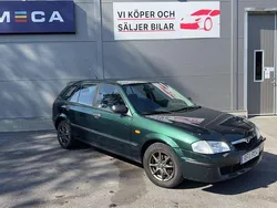 Mörkgrön (grön) Begagnad 2000 Mazda 3 Halvkombi | 32 900 kr