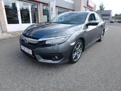 Mörkgrå Begagnad 2017 Honda Civic Executive Sedan | 209 500 kr (Marknadspris)