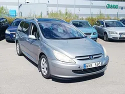 Ljusgrå (grå) Begagnad 2005 Peugeot 307 Kombi | 17 900 kr (Marknadspris)