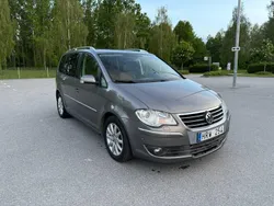 Grå Begagnad 2009 VW Touran Highline Minibuss | 38 900 kr (Bra pris)