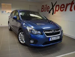 Mörkblå (blå) Begagnad 2013 Subaru Impreza Halvkombi | 109 900 kr (Lite dyr)