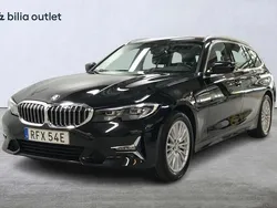 Svart Begagnad 2021 BMW 320 Luxury Line Kombi | 299 900 kr (Marknadspris)