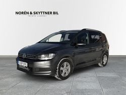 Mörkgrå Begagnad 2016 VW Touran Minibuss | 209 000 kr (Marknadspris)