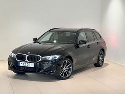 Svart Begagnad 2024 BMW 330e Shadowline Kombi | 499 000 kr