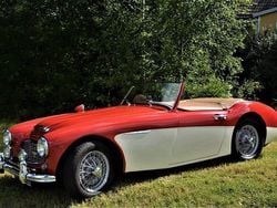 Rödcream/mörkröd skinninredning/svart sufflett Begagnad 1957 Austin Healey 100 Cab | 675 000 kr