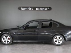 Svart Begagnad 2006 BMW 318 Sedan | 42 900 kr (Marknadspris)