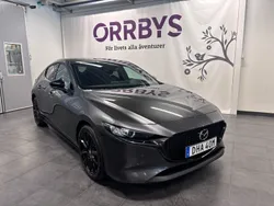 Grå Begagnad 2024 Mazda 3 Homura-Line Halvkombi | 284 900 kr (Marknadspris)