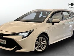 Vit (white) Begagnad 2020 Toyota Corolla Hybrid Kombi | 199 000 kr (Marknadspris)
