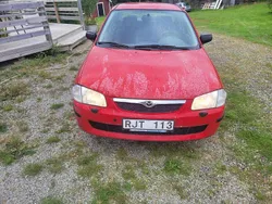 Röd Begagnad 2000 Mazda 323 Sedan | 16 000 kr