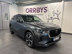 Grå (machine grey metallic) Begagnad 2022 Mazda CX-60 Takumi-Line SUV | 459 000 kr (Marknadspris)