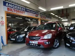Röd (vinröd) Begagnad 2007 Kia Carens Minibuss | 19 999 kr (Marknadspris)