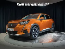 Orange Begagnad 2021 Peugeot e-2008 SUV | 194 900 kr (Marknadspris)