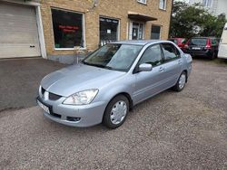 Silver Begagnad 2004 Mitsubishi Lancer Sedan | 19 900 kr (Marknadspris)
