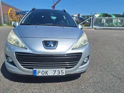 Ljusgrå (grå) Begagnad 2009 Peugeot 207 Kombi | 36 900 kr (Marknadspris)