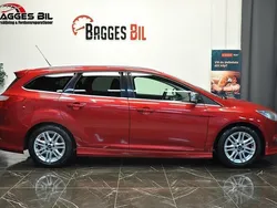 Röd Begagnad 2012 Ford Focus Titanium Kombi | 59 900 kr (Marknadspris)