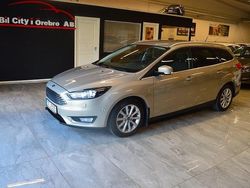 Grå Begagnad 2014 Ford Focus Titanium Kombi | 79 900 kr (Marknadspris)