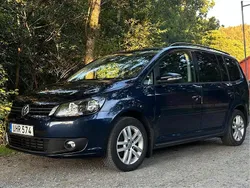 Blå Begagnad 2011 VW Touran Minibuss | 130 000 kr (Dyr)