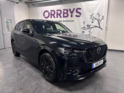 Svart Ny 2025 Mazda CX-60 Homura-Line SUV | 595 400 kr (Marknadspris)