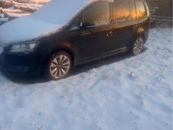 Svart Begagnad 2012 VW Touran Minibuss | 20 000 kr