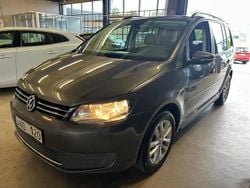 Mörkgrå (gråmetallic) Begagnad 2011 VW Touran Minibuss | 79 900 kr (Lite dyr)