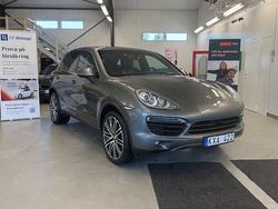 Mörkgrå (grå) Begagnad 2011 Porsche Cayenne S E-Hybrid SUV | 219 900 kr (Marknadspris)
