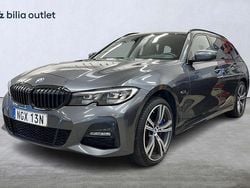 Grå Begagnad 2021 BMW 330e M Sport Kombi | 294 900 kr (Marknadspris)