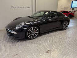 Svart Begagnad 2012 Porsche 911 Carrera Sportkupé | 750 000 kr