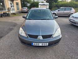 Mörkgrå (grå) Begagnad 2007 Mitsubishi Lancer Sedan | 49 900 kr (Dyr)