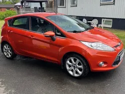 Orange Begagnad 2012 Ford Fiesta Titanium Halvkombi | 34 900 kr (Marknadspris)