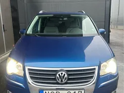 Blå Begagnad 2008 VW Touran Highline Minibuss | 55 000 kr