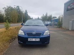 Mörkblå Begagnad 2003 Toyota Corolla Halvkombi | 49 000 kr (Marknadspris)